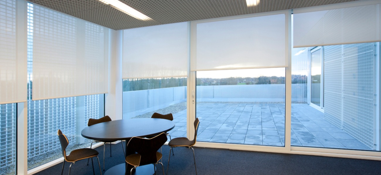electrische rolgordijnen Luxaflex