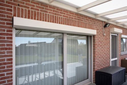 carport, rolluiken, sectionaal poort en pergola in Roeselare