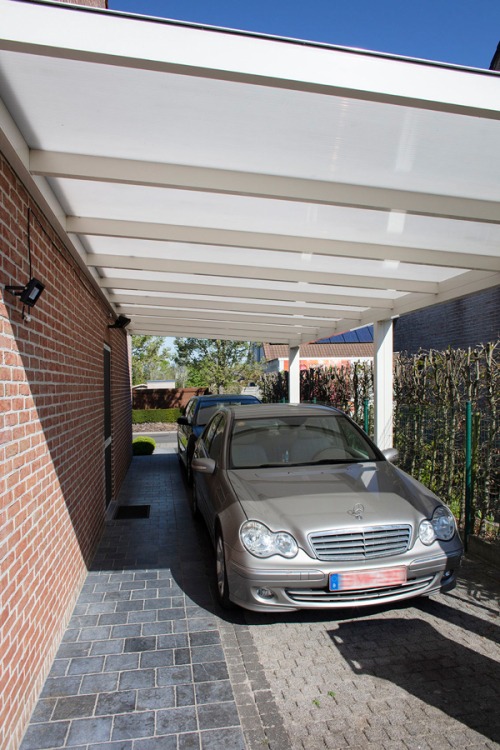 carport, rolluiken, sectionaal poort en pergola in Roeselare