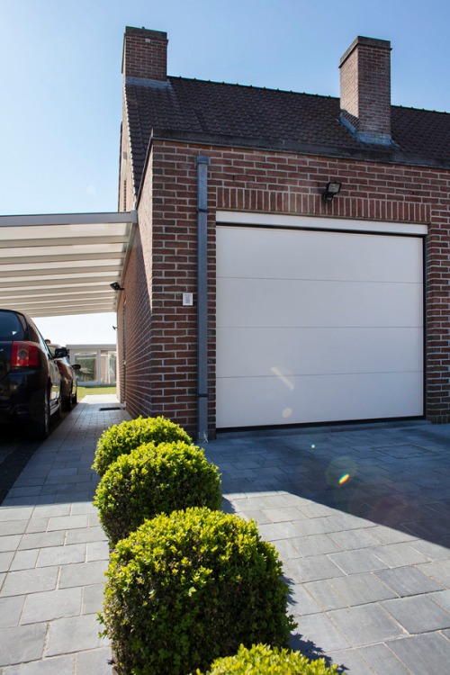 carport, rolluiken, sectionaal poort en pergola in Roeselare