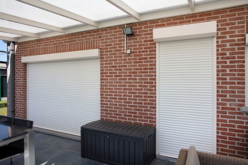 carport, rolluiken, sectionaal poort en pergola in Roeselare