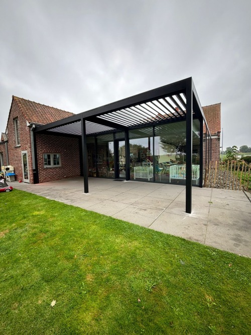 terrasoverkapping lamellendak in Rollegem