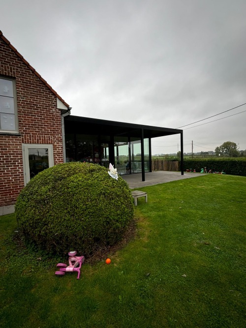 terrasoverkapping lamellendak in Rollegem