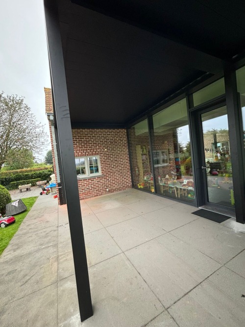 terrasoverkapping lamellendak in Rollegem
